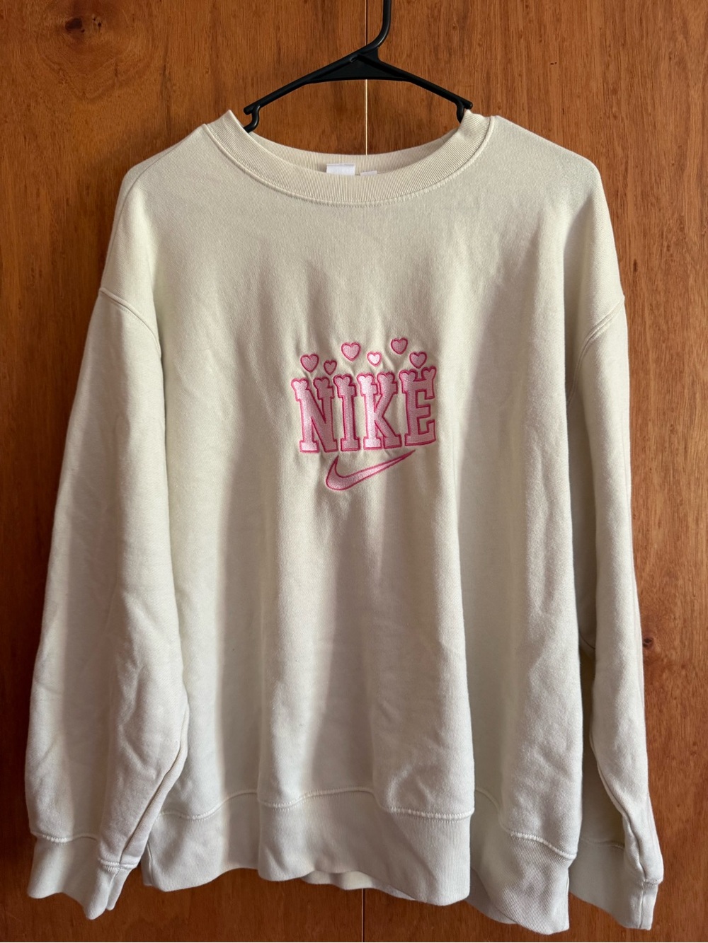 Nike Cream Crewneck Sweatshirt with Pink Logo Accents
